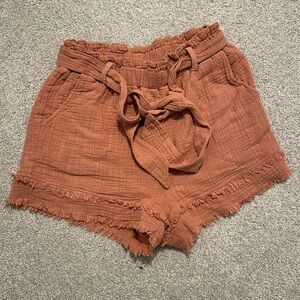Pink tie shorts, size small.